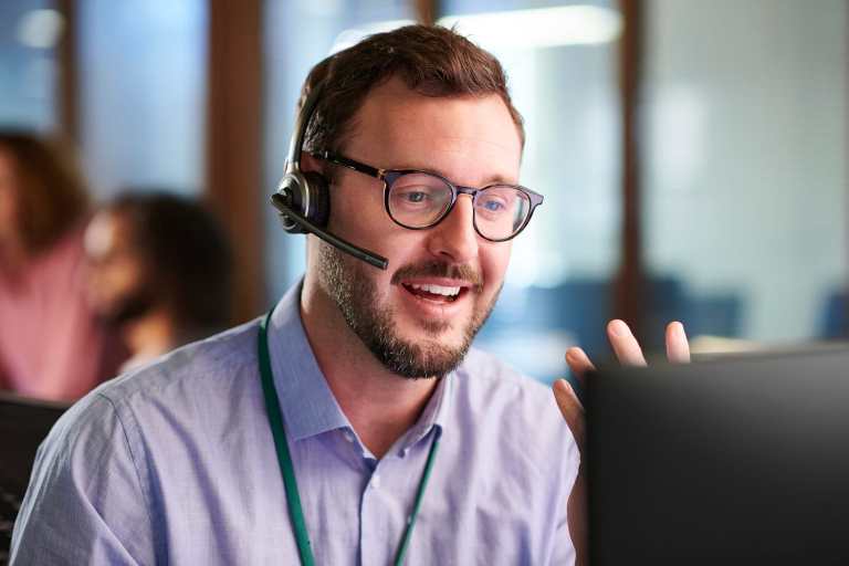 Brotherly Technology support technician assisting a client by phone